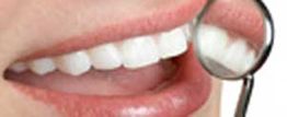 Clínica Dental David Romero dientes y lupa